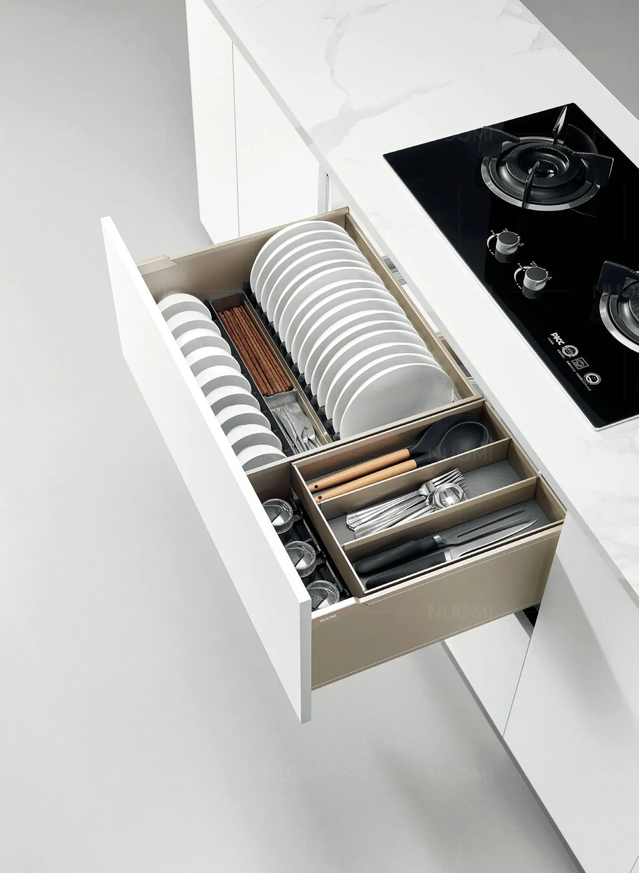 Kitchen cabinet drawer with a fitted tableware storage basket