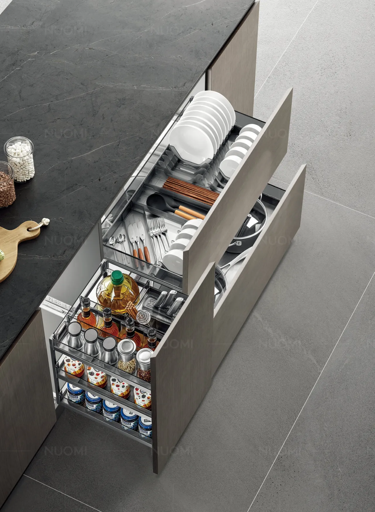 Open kitchen drawers with fitted storage for plates, utensils and pantry supplies