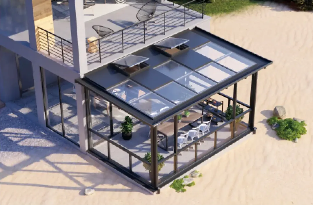 Glazed sunroom with a sloping roof and opening panels beside a terrace