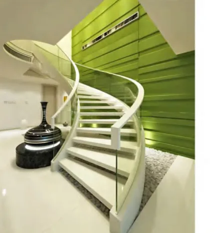 Spiral staircase with pale treads and a curved handrail
