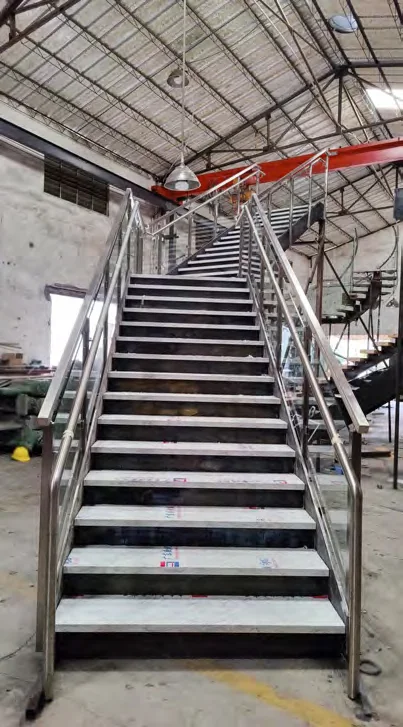 Straight metal stair flight with railing in the staircase catalogue