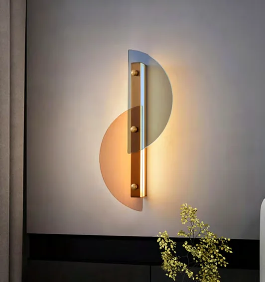 Wall light with an oval backplate in a catalogue interior