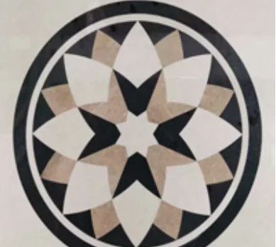 Geometric stone medallion in black, cream and grey within a square border