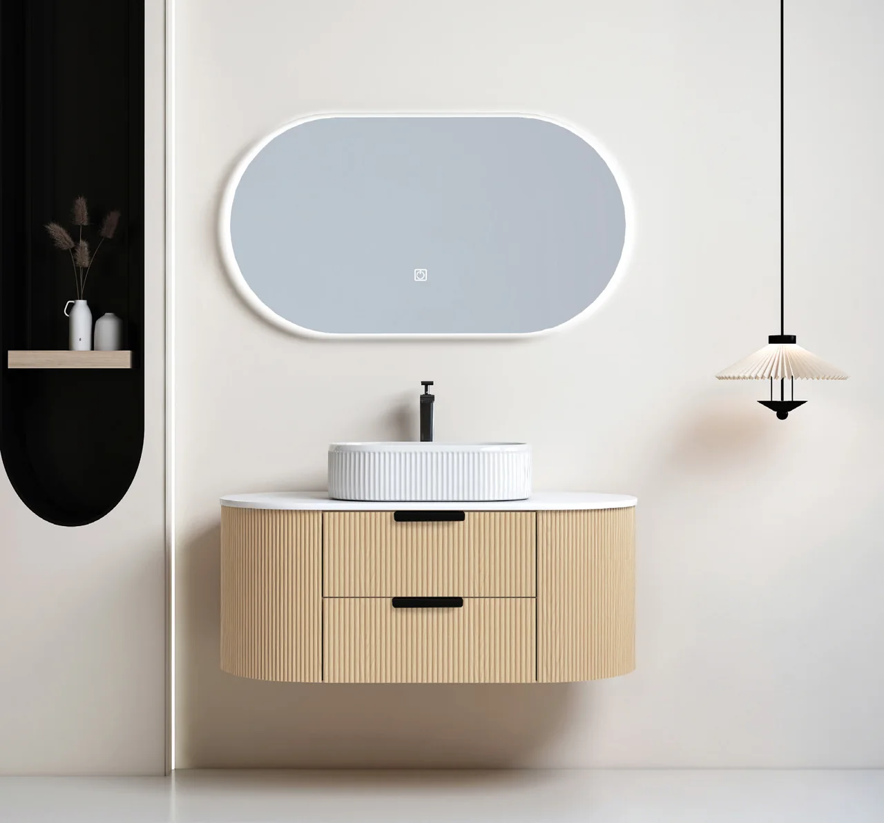 Wall-mounted curved vanity with vessel basin and oval illuminated mirror