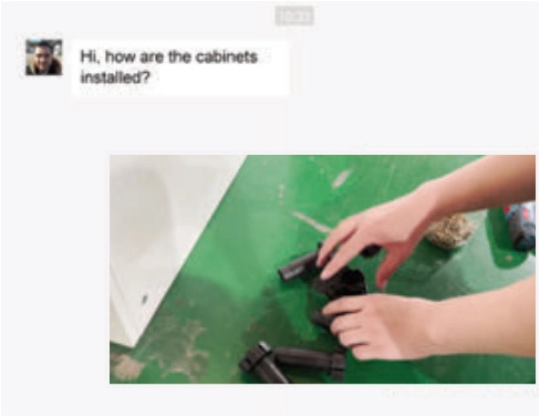 Chat asking how cabinets are installed, beside a video still of hands handling black hardware components